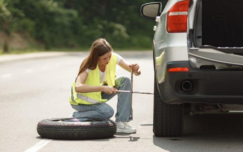 change a flat tire