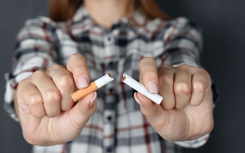 beautiful woman smoking cigarette